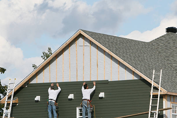 Professional Siding Installation technician working in Roxbury, MA